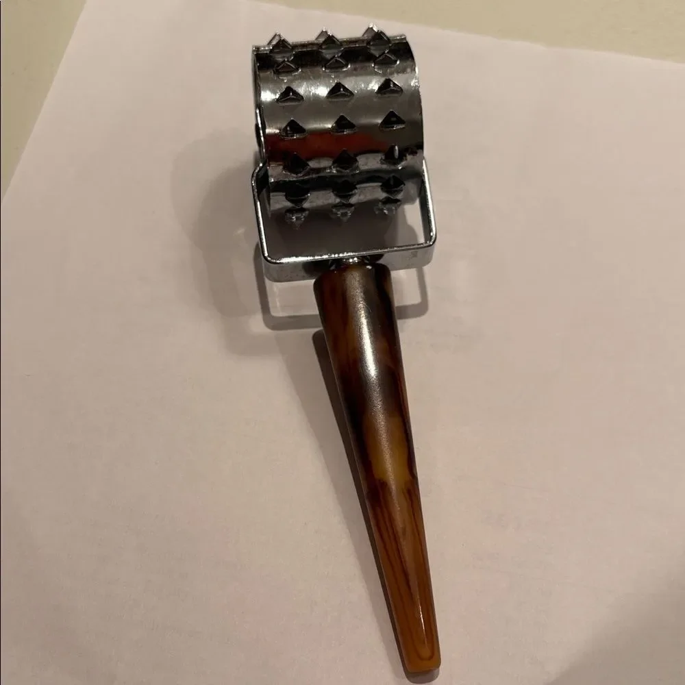 Vintage meat tenderizer bakelite handle